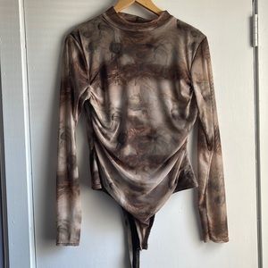 Mesh long sleeve body suit from pretty little thing